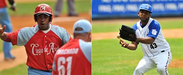 A la izquierda el tercera base Raúl González, productor del doble que trajo la carrera decisiva del encuentro en el 7mo episodio. A la derecha el lanzador derrotado Odrisamer Despaigne quien realizó una honorable faena en el Juego #1 de la Final de Cuba. (Fotos: Yamil Lage)