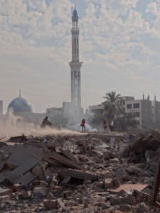 Journalists in the rubble. HT file photo from Gaza by Julie Webb-Pulman