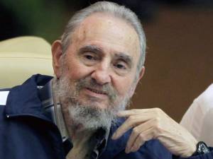 Fidel Castro makes a surprise appearance at the 6th Communist Party Congress in Havana, Cuba, Tuesday April 19, 2011. Cuba's President Raul Castro was named first secretary of Cuba's Communist Party on Tuesday, with Fidel not included in the leadership for the first time since the party's creation 46 years ago. (AP Photo/Javier Galeano)